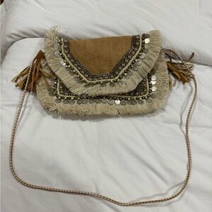 Revolve gold shimmer purse